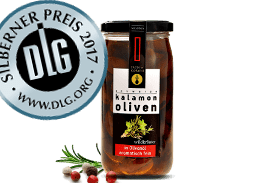 Taste of Koroni schwarze Oliven mit Wildkräutern in Olivenöl - Glas 330g